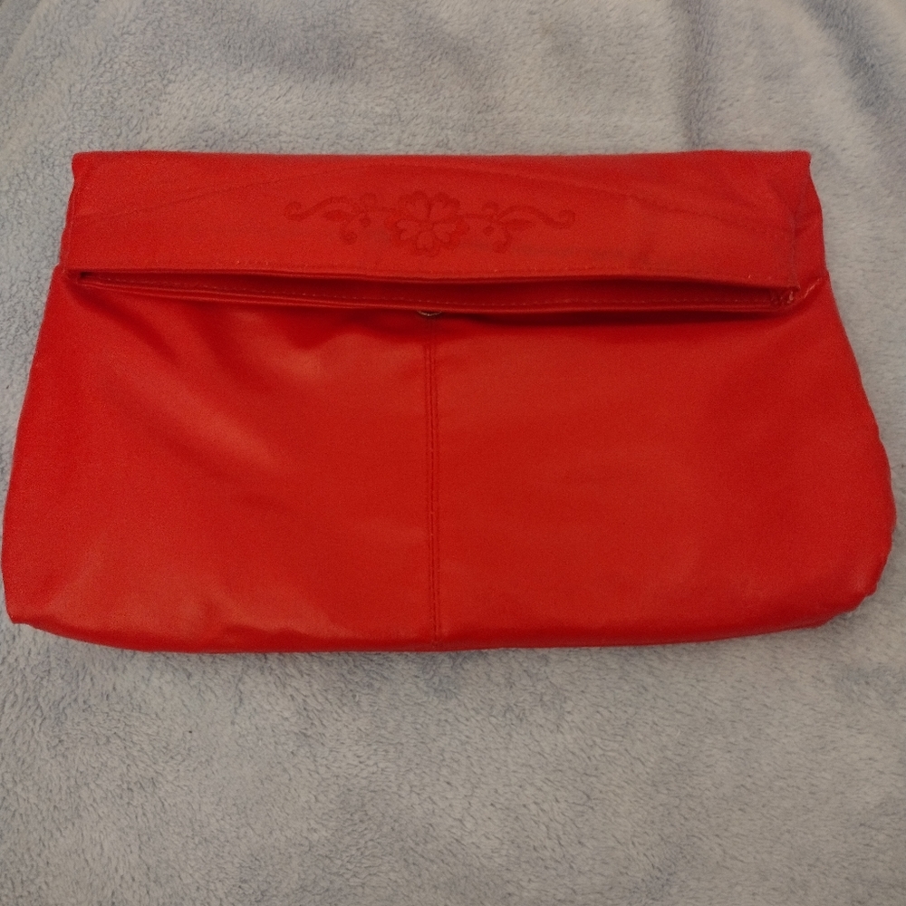 Fire engine red Ralfaux purse, on the smaller to medium size.